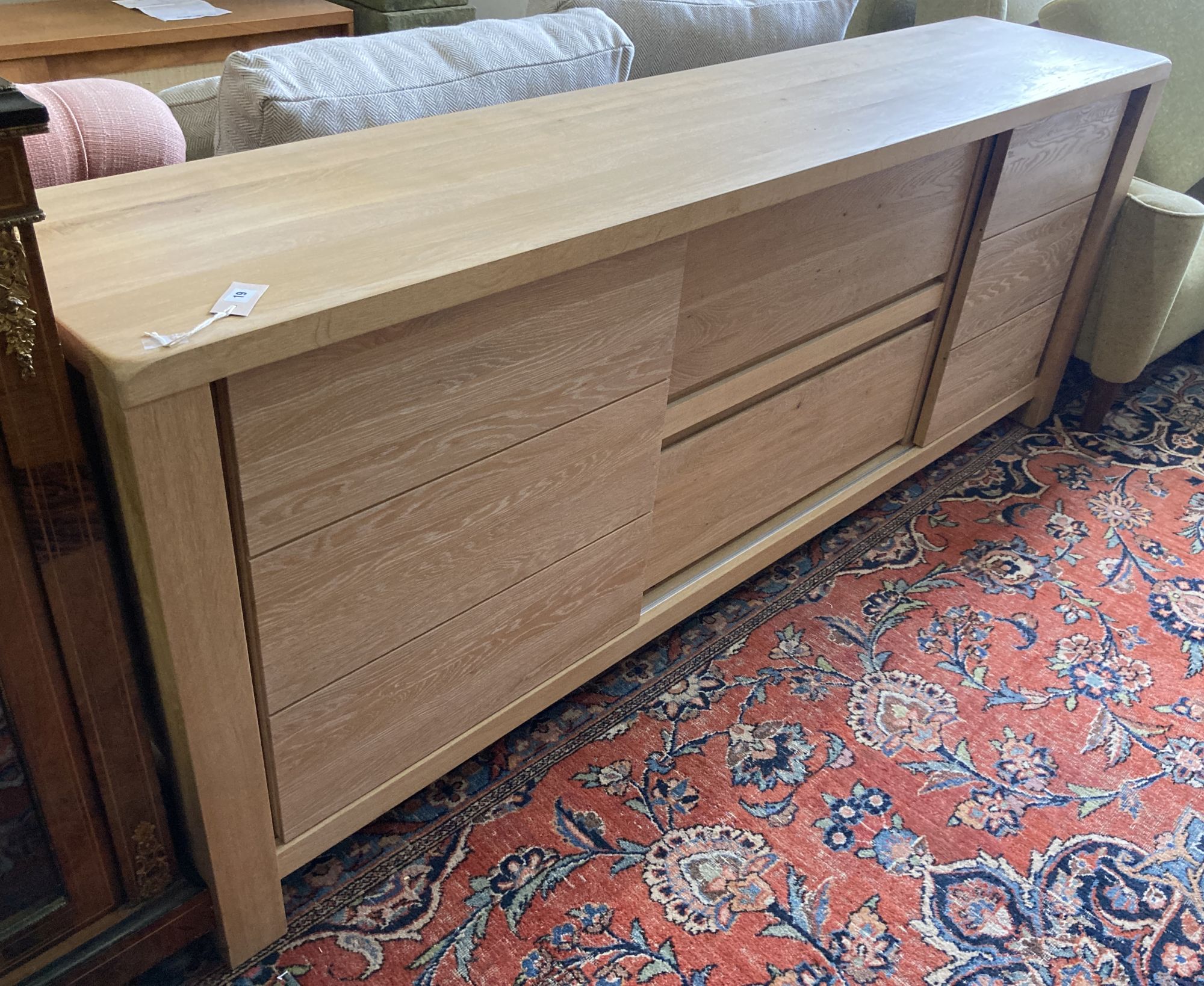 A modern contemporary oak sideboard, length 220cm, depth 45cm, height 85cm